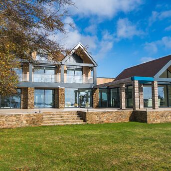 SlimLine 68 Windows, ConceptPatio 130 Sliding & Folding and ConceptSystem 77 Doors - Waters Edge located in Exeter, United Kingdom