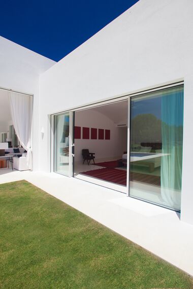 ConceptSystem 77 Doors, ConceptPatio 68 Sliding & Folding and HiFinity Sliding & Folding - Las Palmeras located inSpain