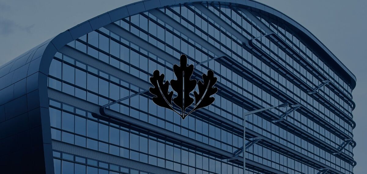 LEED logo in front of glass façade.