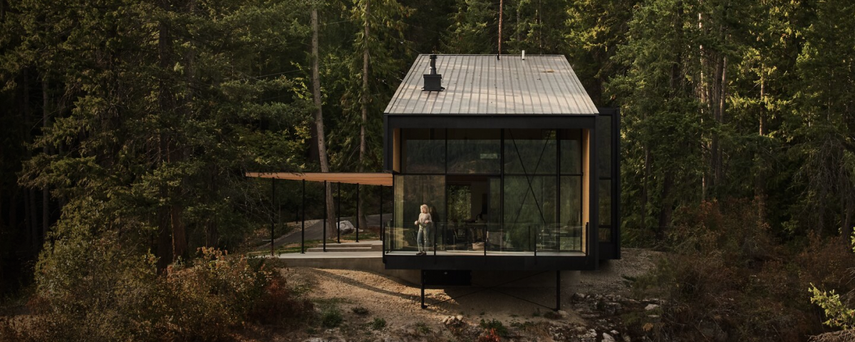 Summer Cabin on a rocky terrain with generous outdoor patios